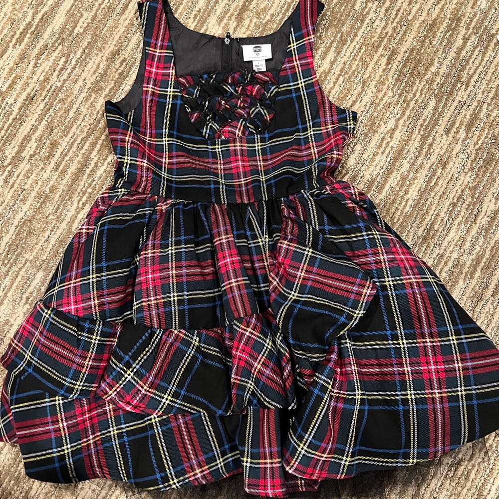 Adorable plaid dress with tulle ball skirt. Excellent condition, size 10.